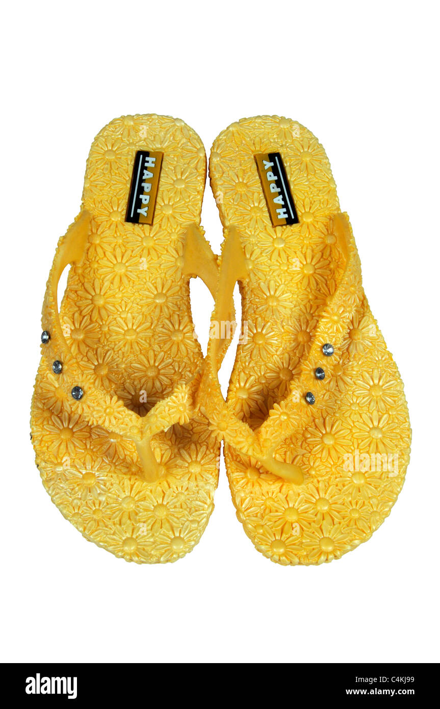 Gelbe Flip-Flops mit Daisy design, Calypso, Costa Del Sol, Provinz Malaga, Andalusien, Spanien, Westeuropa. Stockfoto