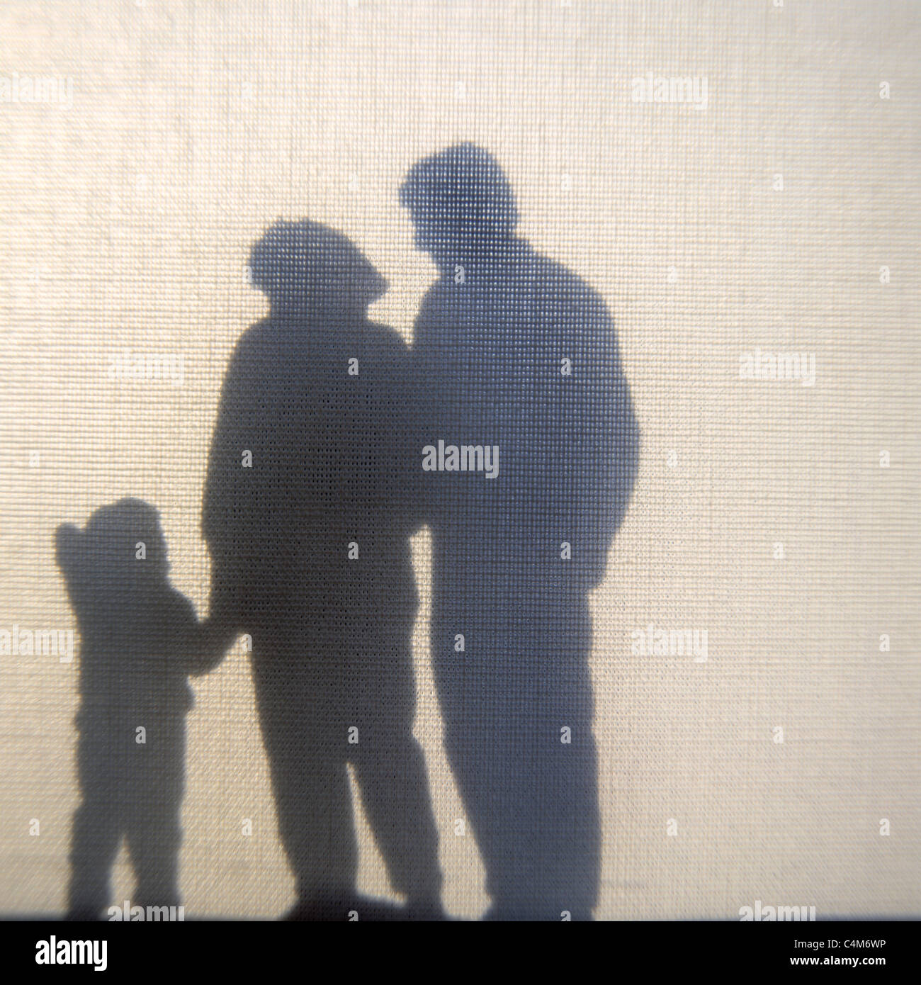 Silhouette einer Familie mit Mutter, Vater und Kind. Stockfoto