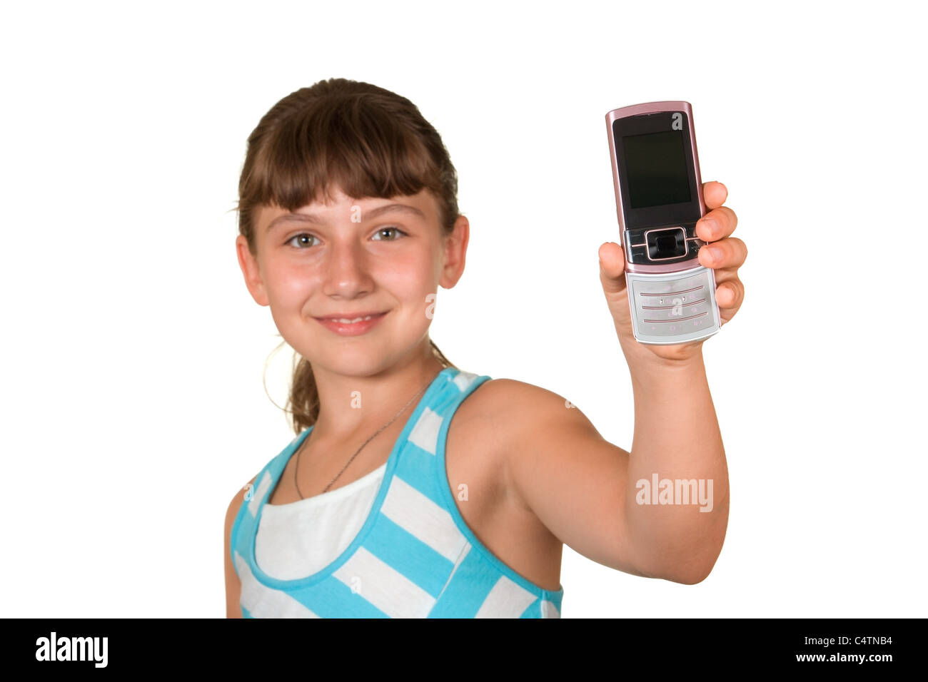Das Mädchen mit einem Mobiltelefon Stockfoto