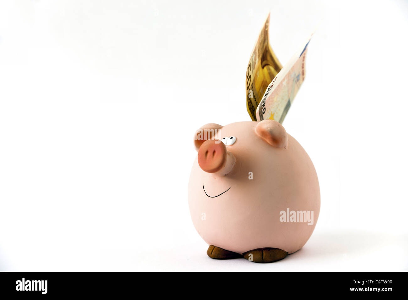 Sparschwein mit einem 50 Euro-Schein Stockfoto