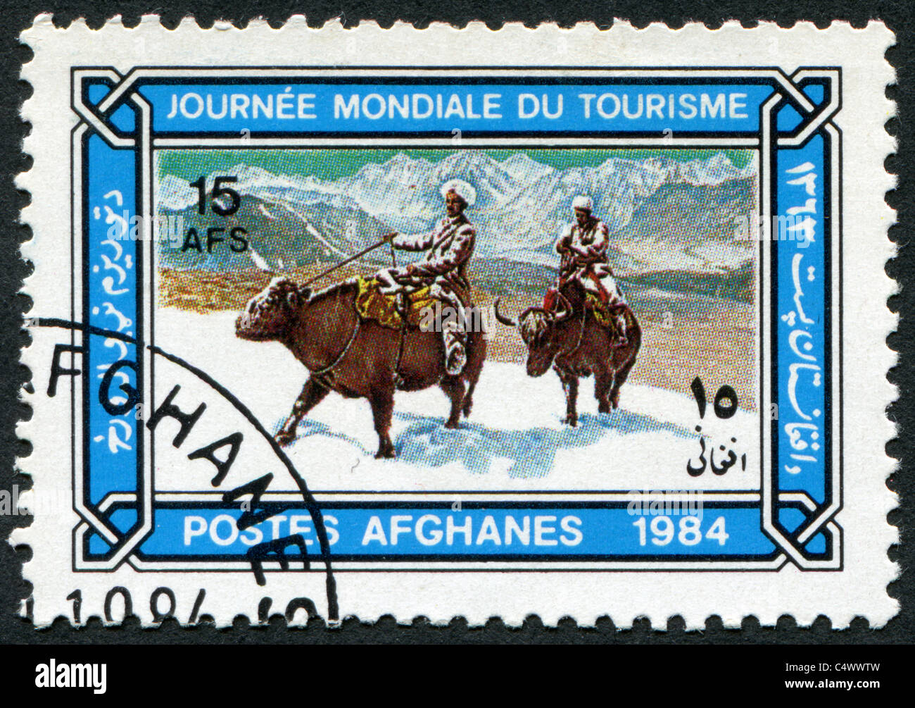 AFGHANISTAN 1984: Eine Briefmarke gedruckt in afghanischen Welttourismustag gewidmet. Zeigt Buffalo Fahrer im Schnee. Stockfoto