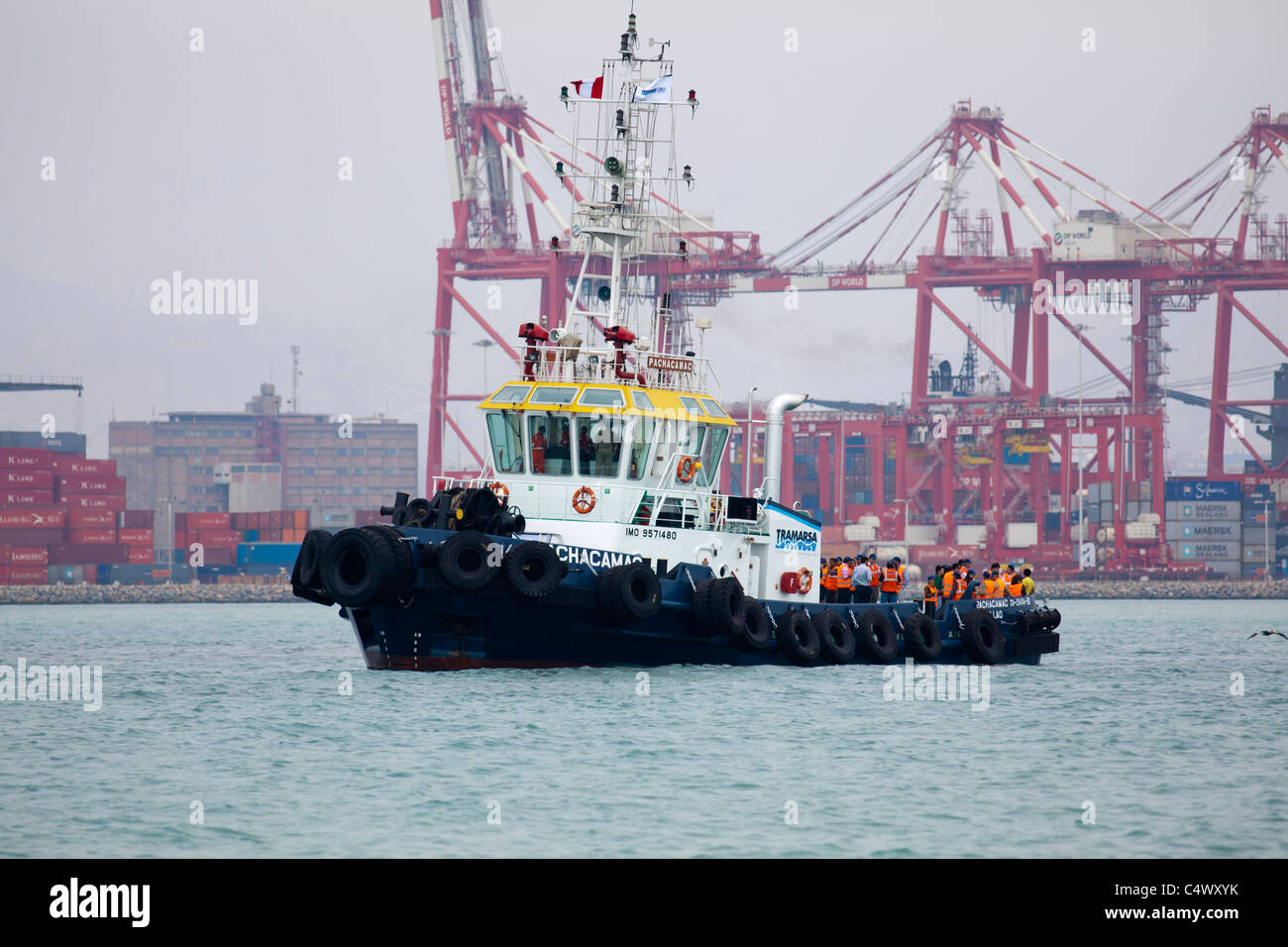 Schlepper-hosting eine Arbeiter Mittagessen-Funktion, Hafen Callao, Lima. Peru Stockfoto