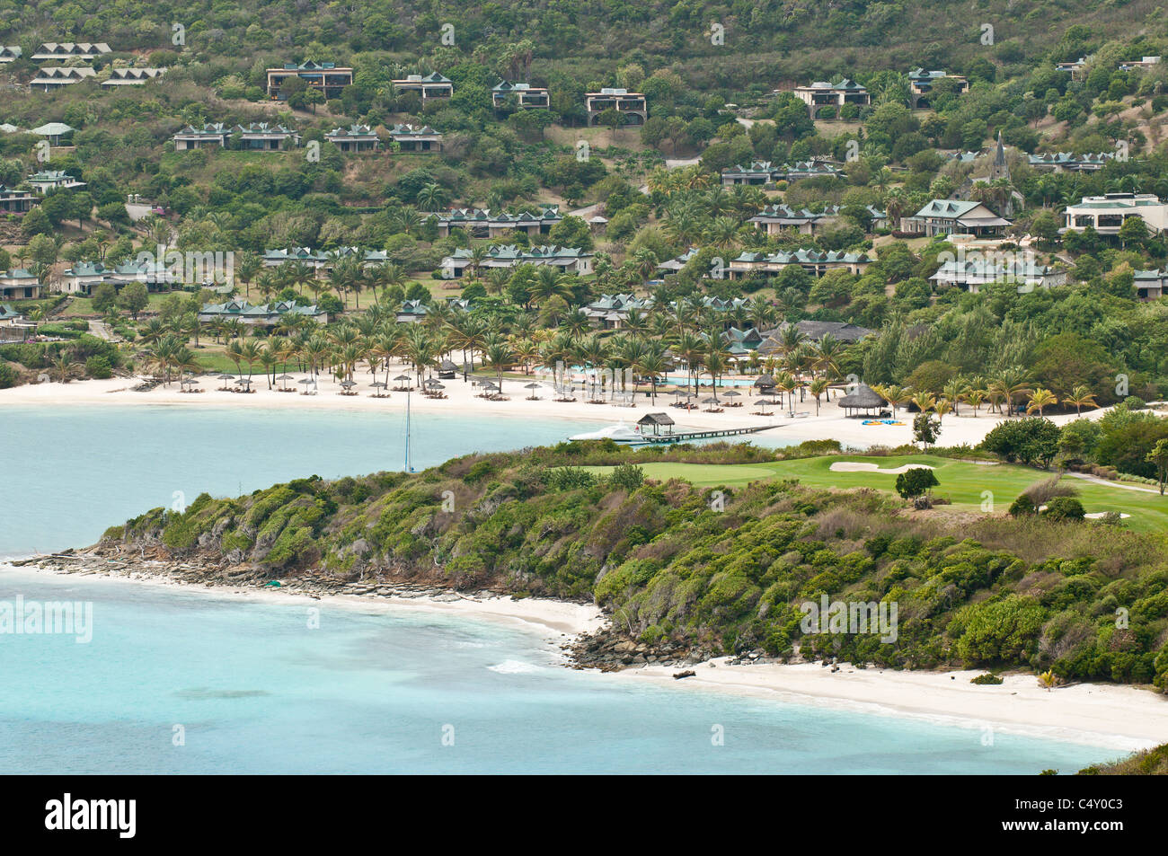 Golfplatz im Canouan Estate Resort & Villas in Carenage Bay, Canouan Island, St. Vincent & die Grenadinen. Stockfoto