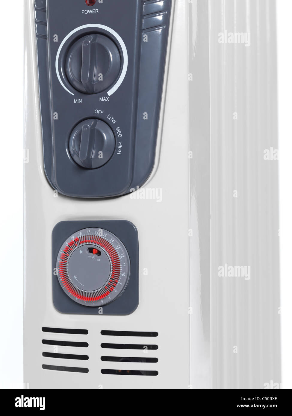 Frontplatte eines Öls gefüllt Luft Heizung Heizkörper mit Thermostat und Timer-Regler. Stockfoto