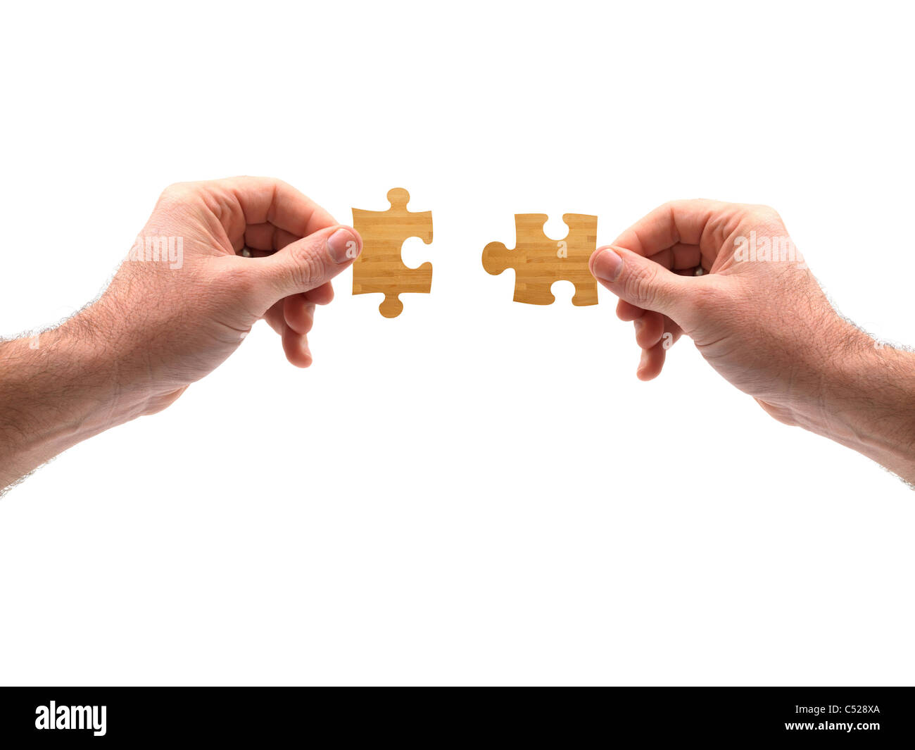 Hölzerne Puzzleteile geschnürt auf weiß Stockfoto
