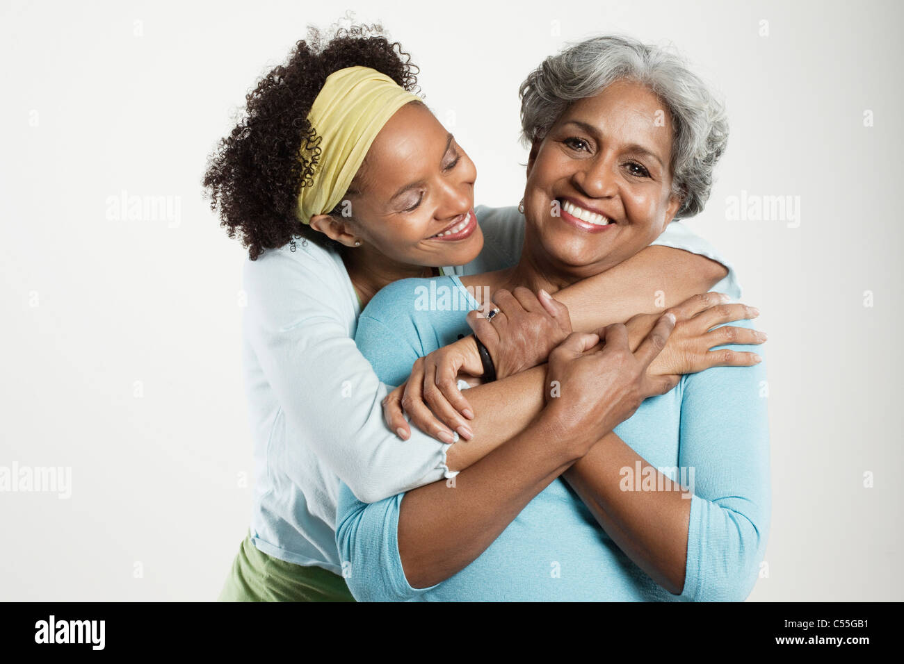 Porträt einer älteren Frau mit ihrer Tochter lächelnd Stockfoto