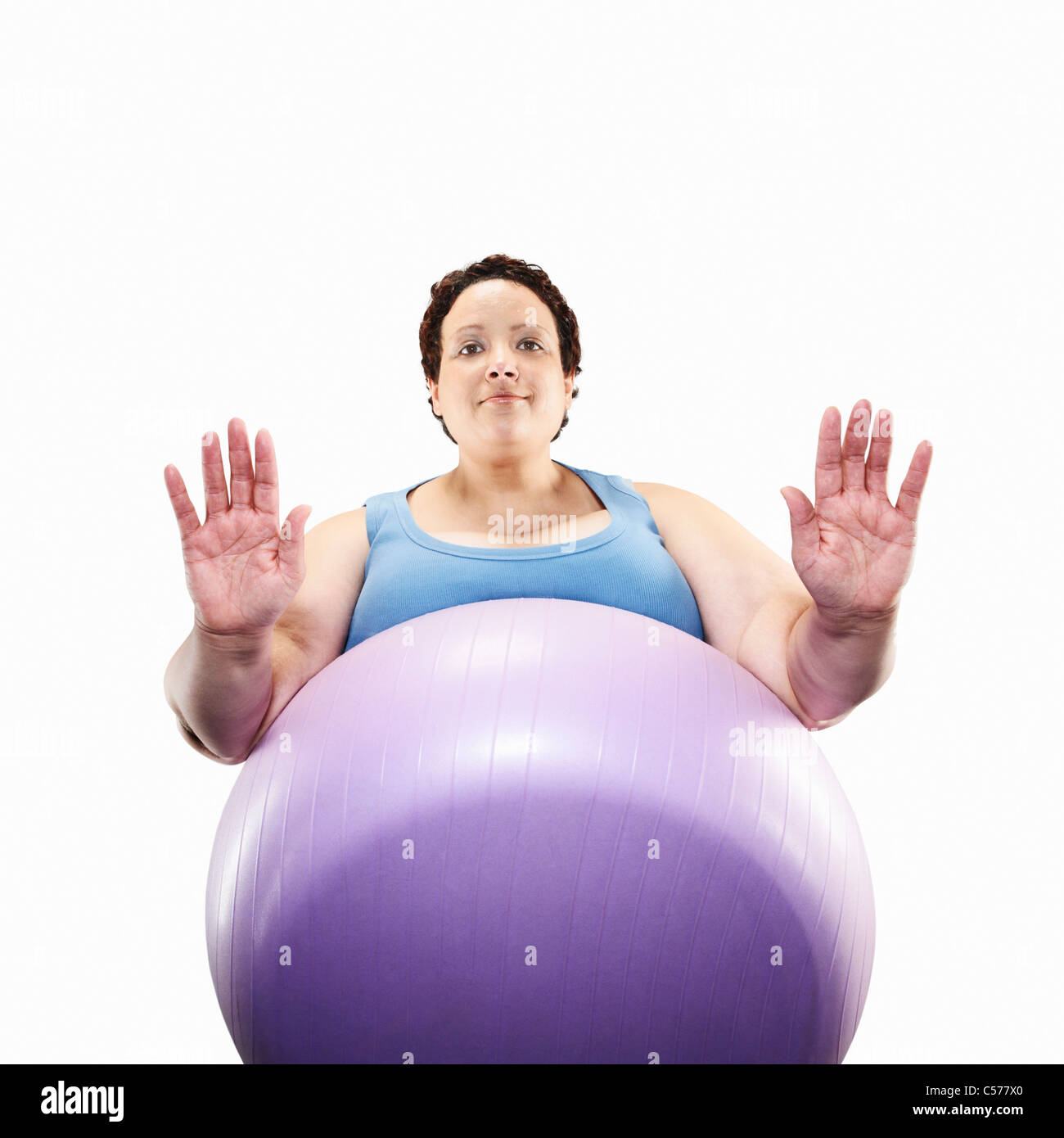 Große Frau mit Gymnastikball Stockfoto