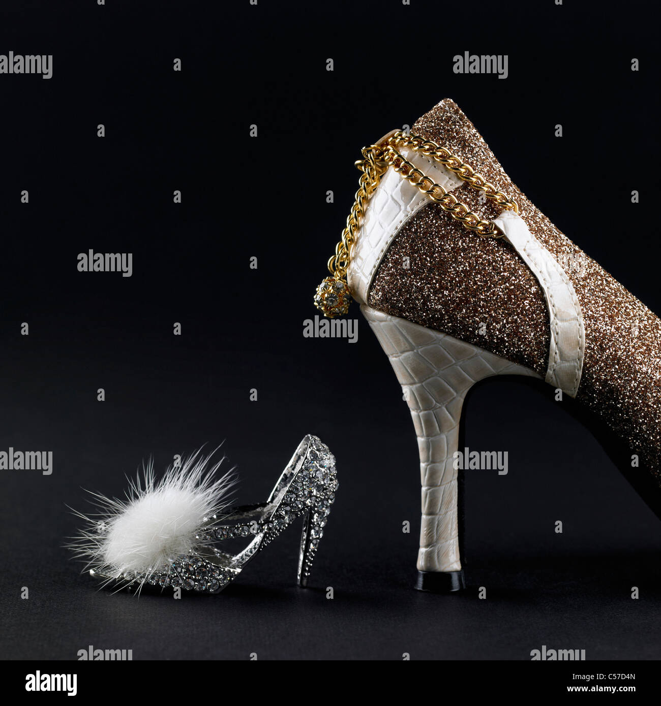 high Heel Gold Birne und Miniatur Stockfoto