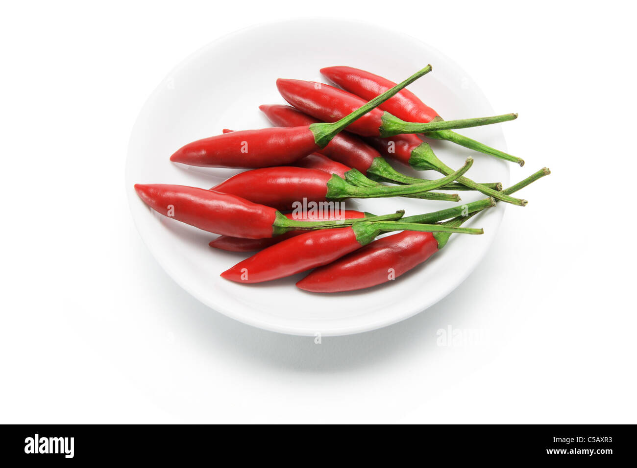 Teller mit roten Chilischoten Stockfoto