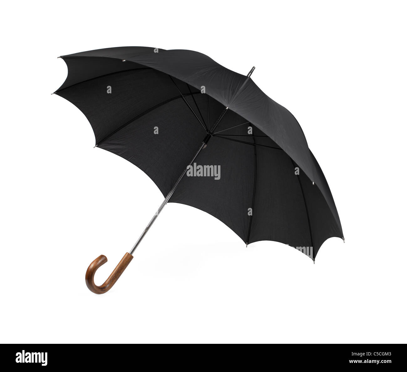 Schwarze Vintage Schirm isoliert auf weiss mit einigen natürlichen Schatten. Stockfoto