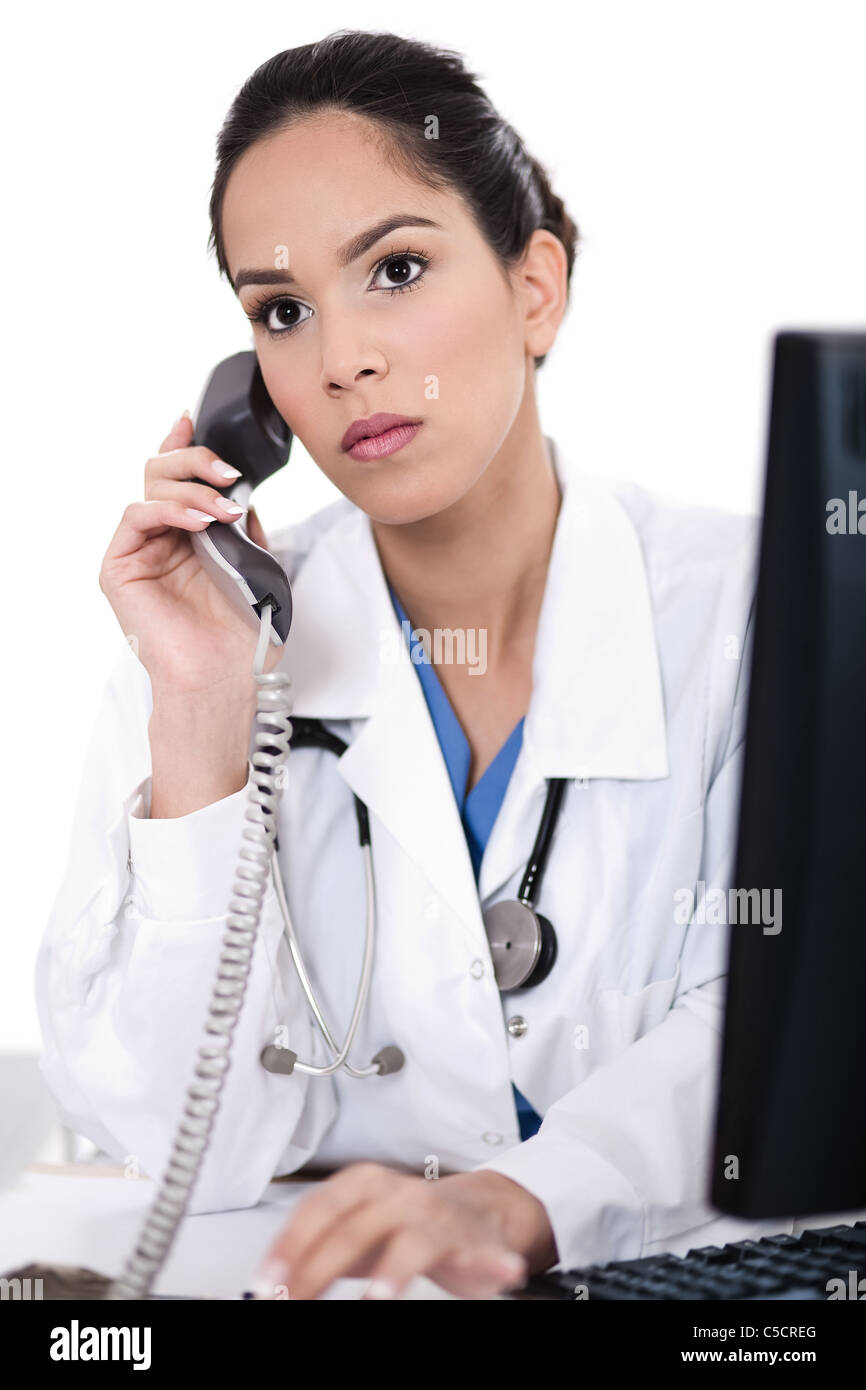 Beschäftigt bei der Telefon-Ärztin in ihrer Kabine Stockfoto