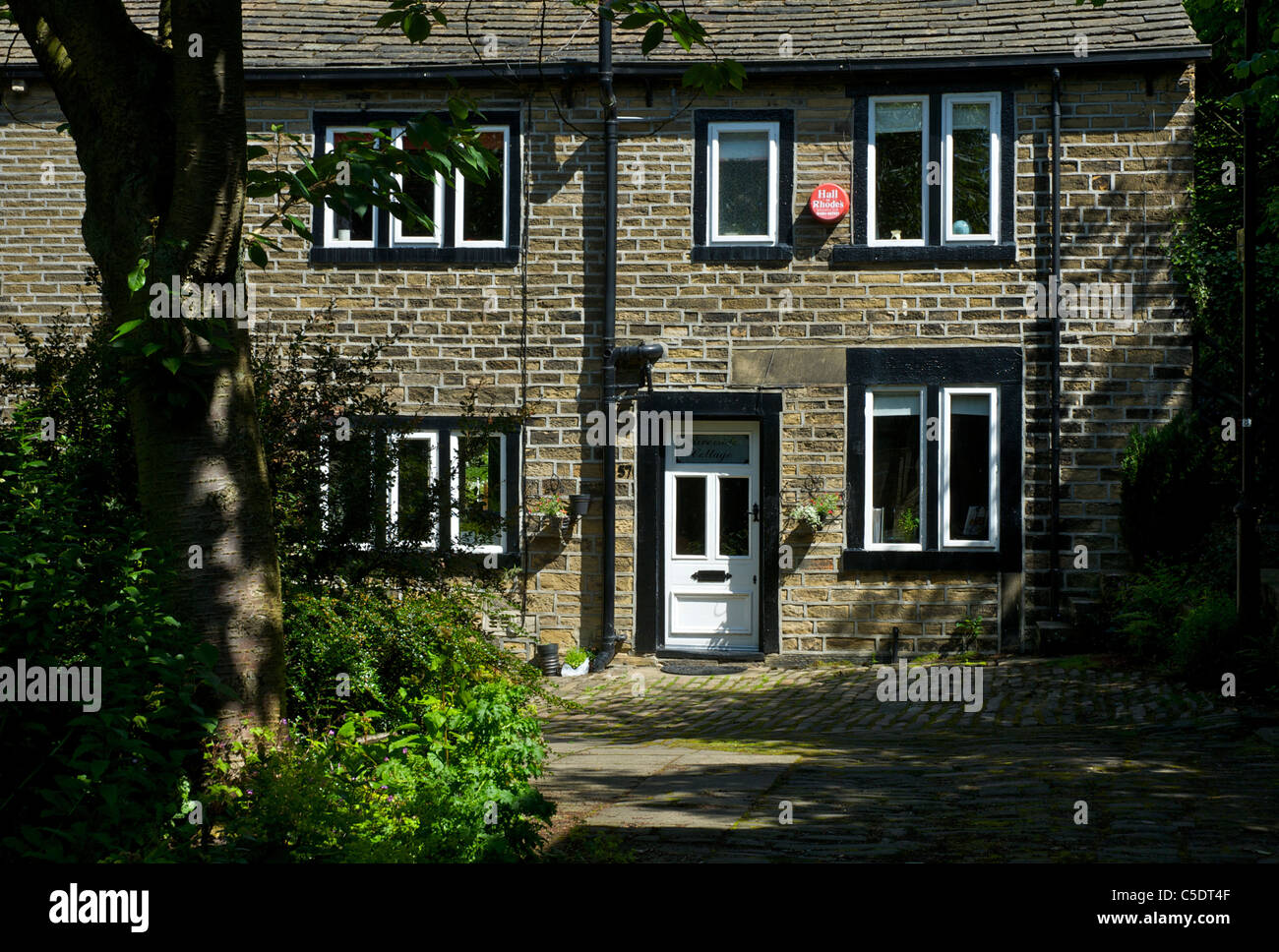 Steinhaus im Dorf Luddenden, in der Nähe von Halifax, Calderdale, West Yorkshire, England UK Stockfoto