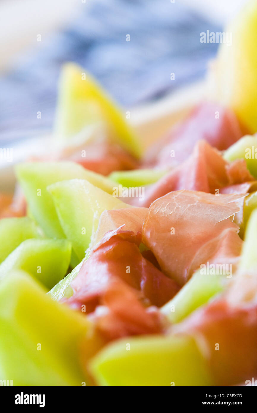 Melone mit Ardenner Schinken Stockfoto