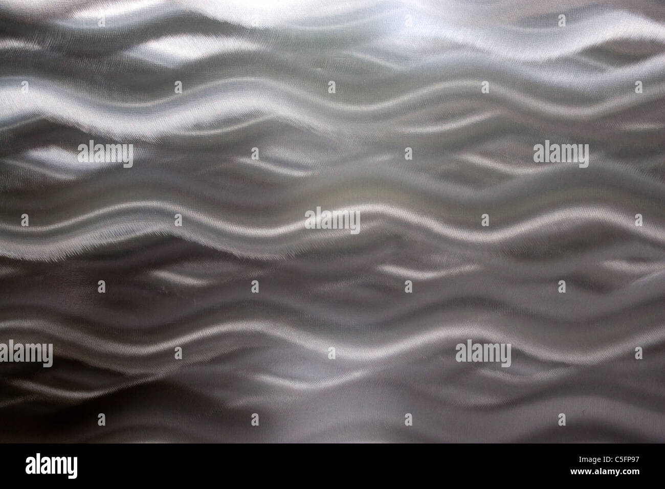 Eine sehr einzigartige gebürstetem Aluminium Textur, die ideal für einen metallischen Hintergrund funktioniert. Stockfoto