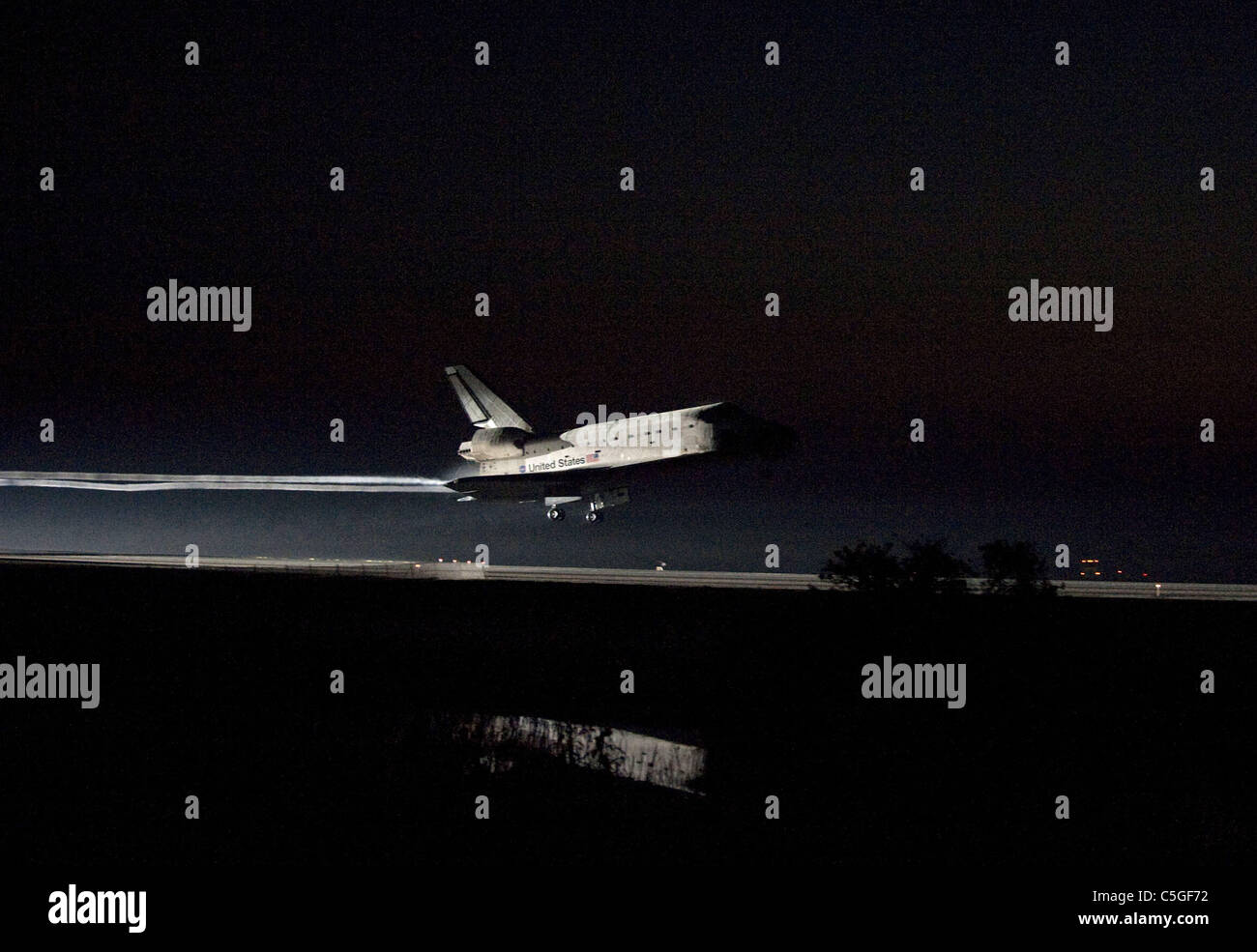 Letzte Space Shuttle Mission landet Atlantis am Kennedy Space Center Stockfoto