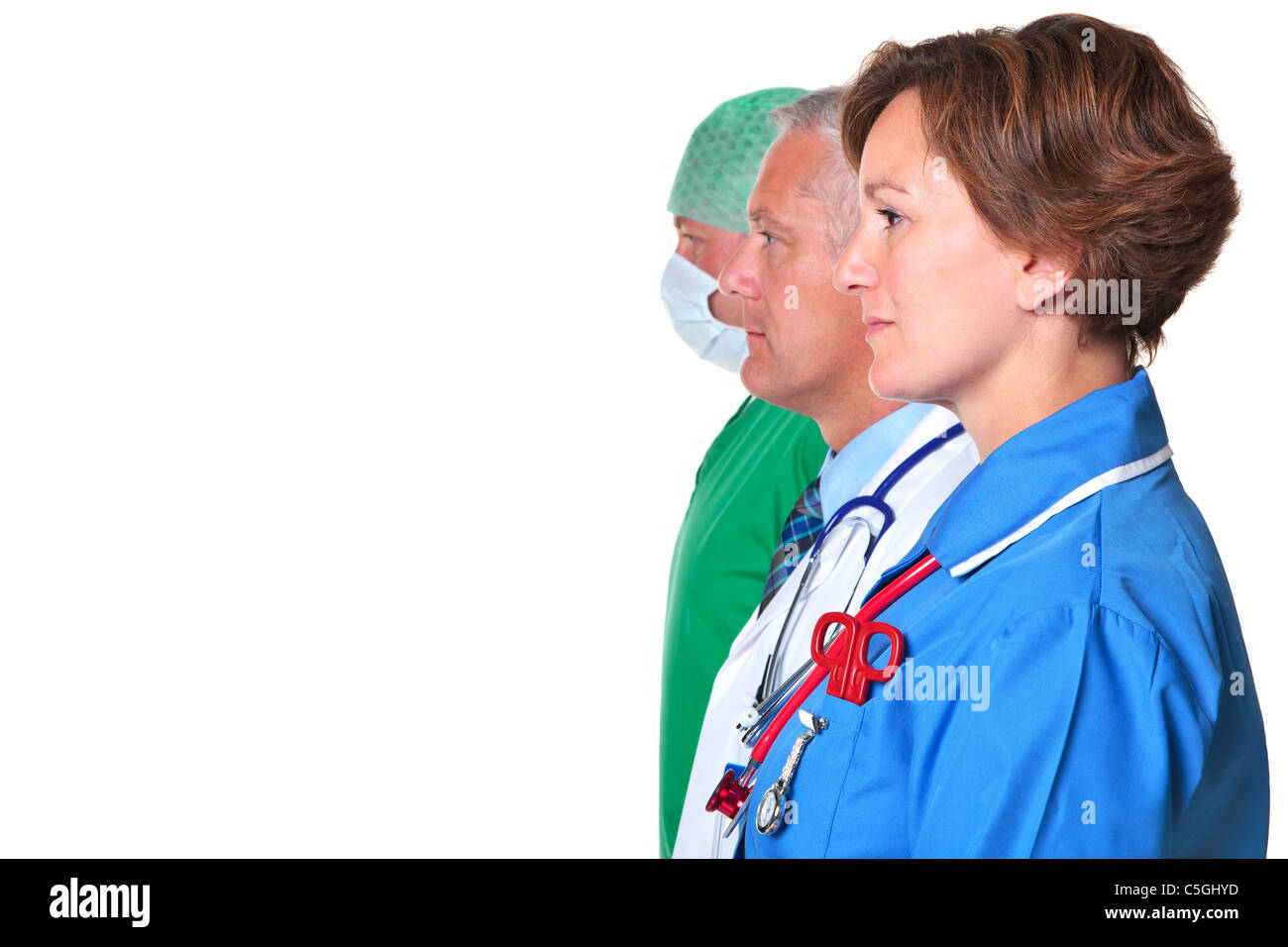 Foto von einer Krankenschwester, Arzt und Chirurg im Profil vor einem weißen Hintergrund isoliert. Stockfoto