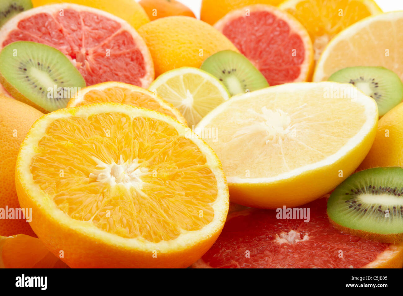Frische Zitrusfrüchte Früchte und Kiwi-Hintergrund Stockfoto