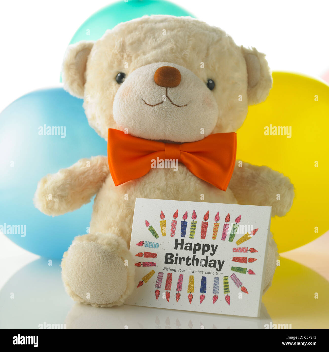 Luftballons und ein Teddybär Stockfoto