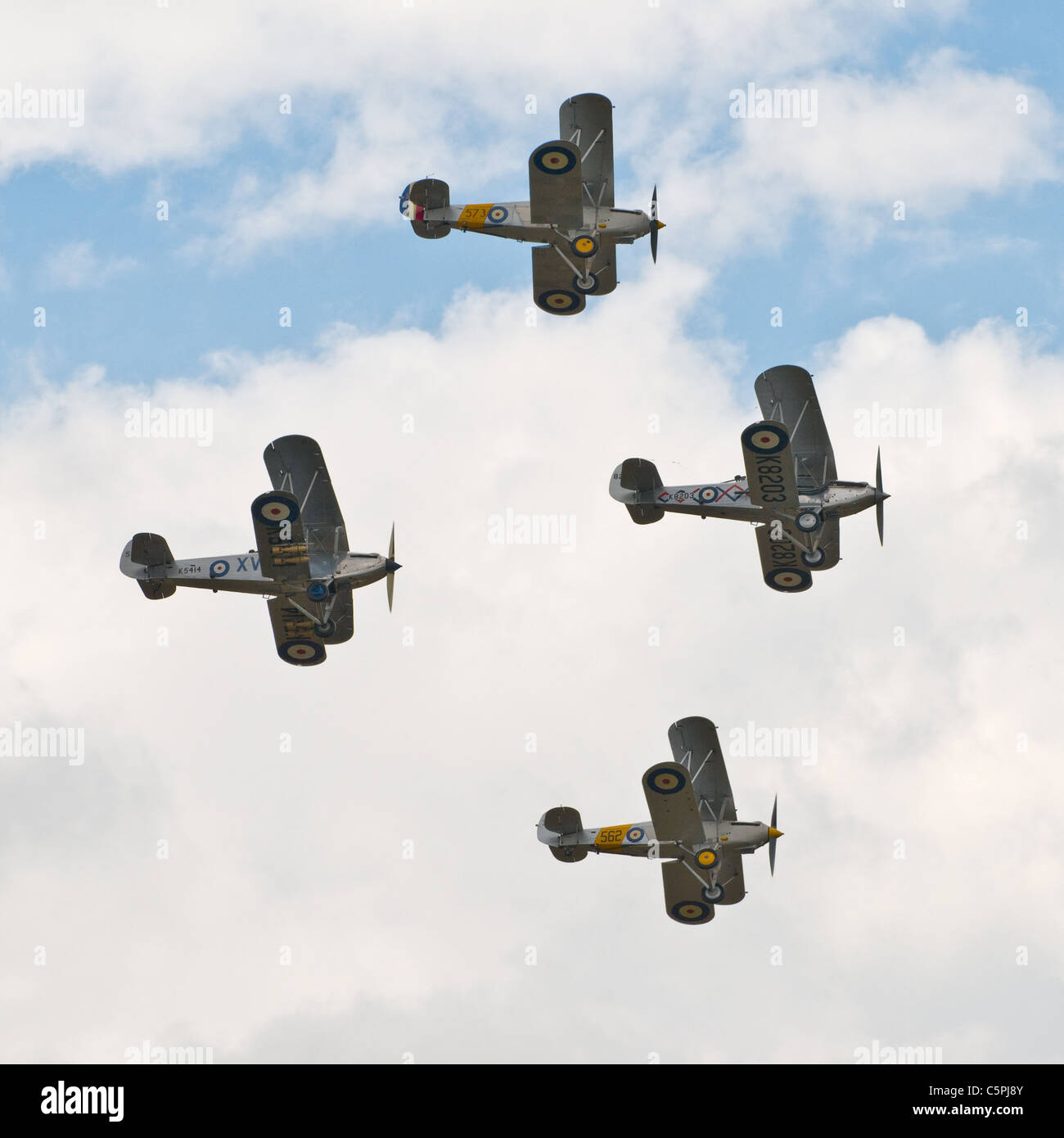 Vier Vintage Bi-Flugzeuge fliegen in Formation, Duxford Airshow 2011 Stockfoto