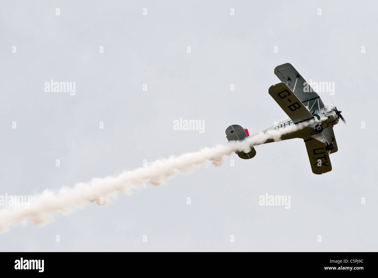 Duxford Air Show, ein einzelnes Seater WWI / WWII Biicker Jungmeister, deutsche Luftwaffe Kunstflug Doppeldecker Stockfoto