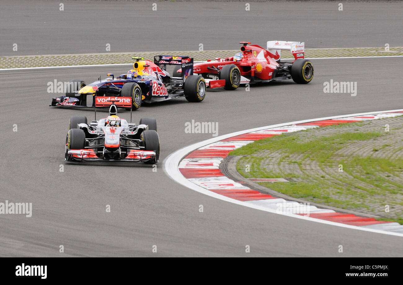 Lewis Hamilton vor Mark Webber und Fernando Alonso, während die deutschen Formel 1 Grand Prix 2011 Stockfoto
