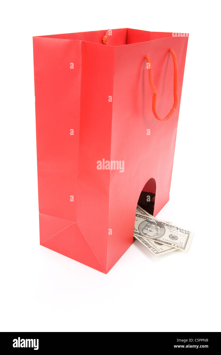 Isolierte Einkaufstasche und US-Dollar, Konzept des unternehmerischen Risikos Stockfoto