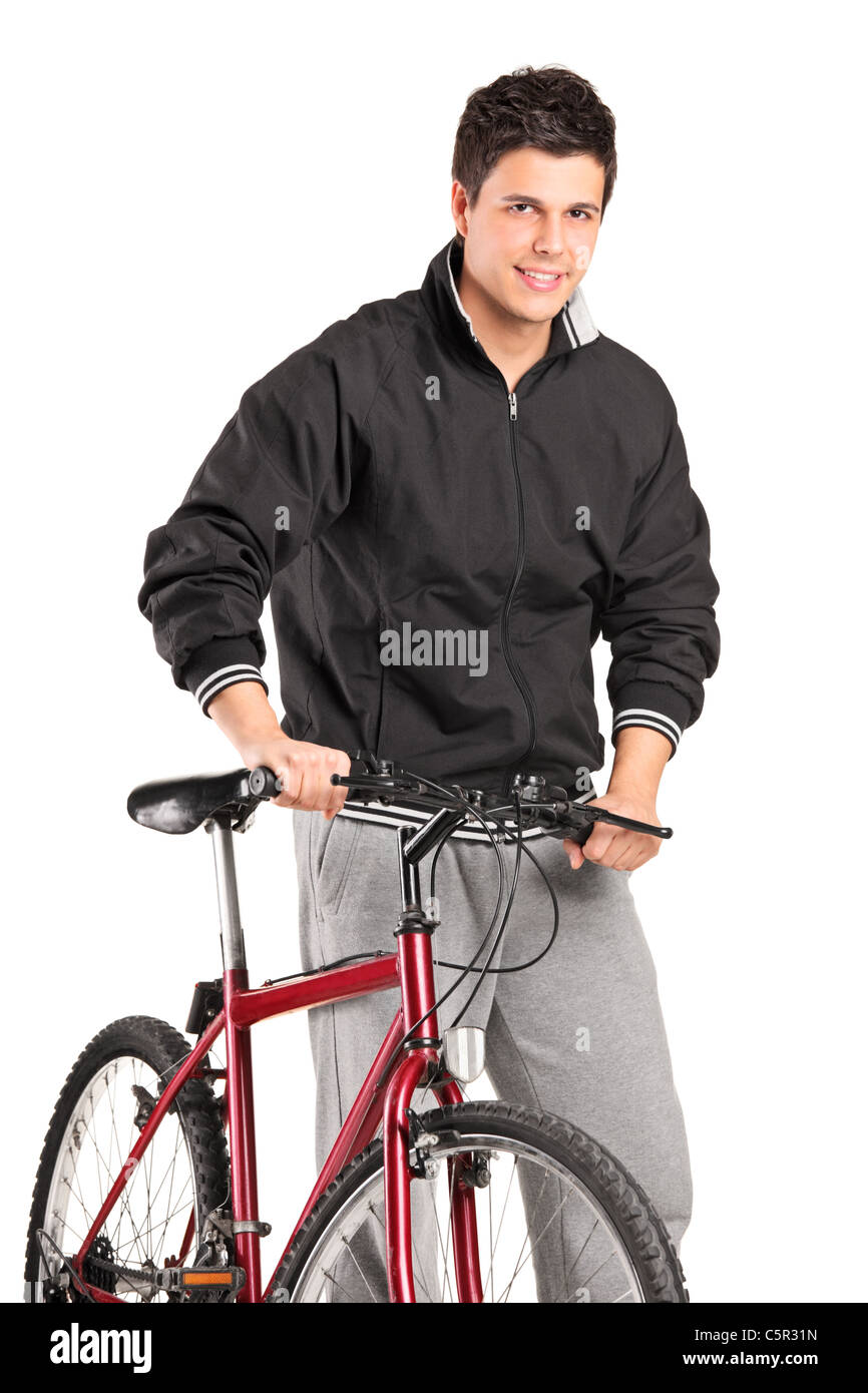 Ein kleiner Junge posiert auf dem Fahrrad Stockfoto