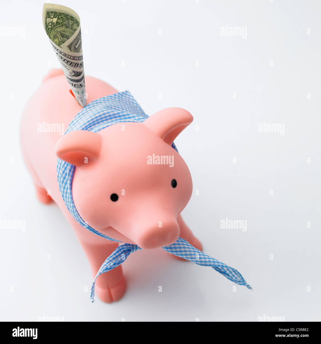 Sparschwein mit Papiergeld Stockfoto