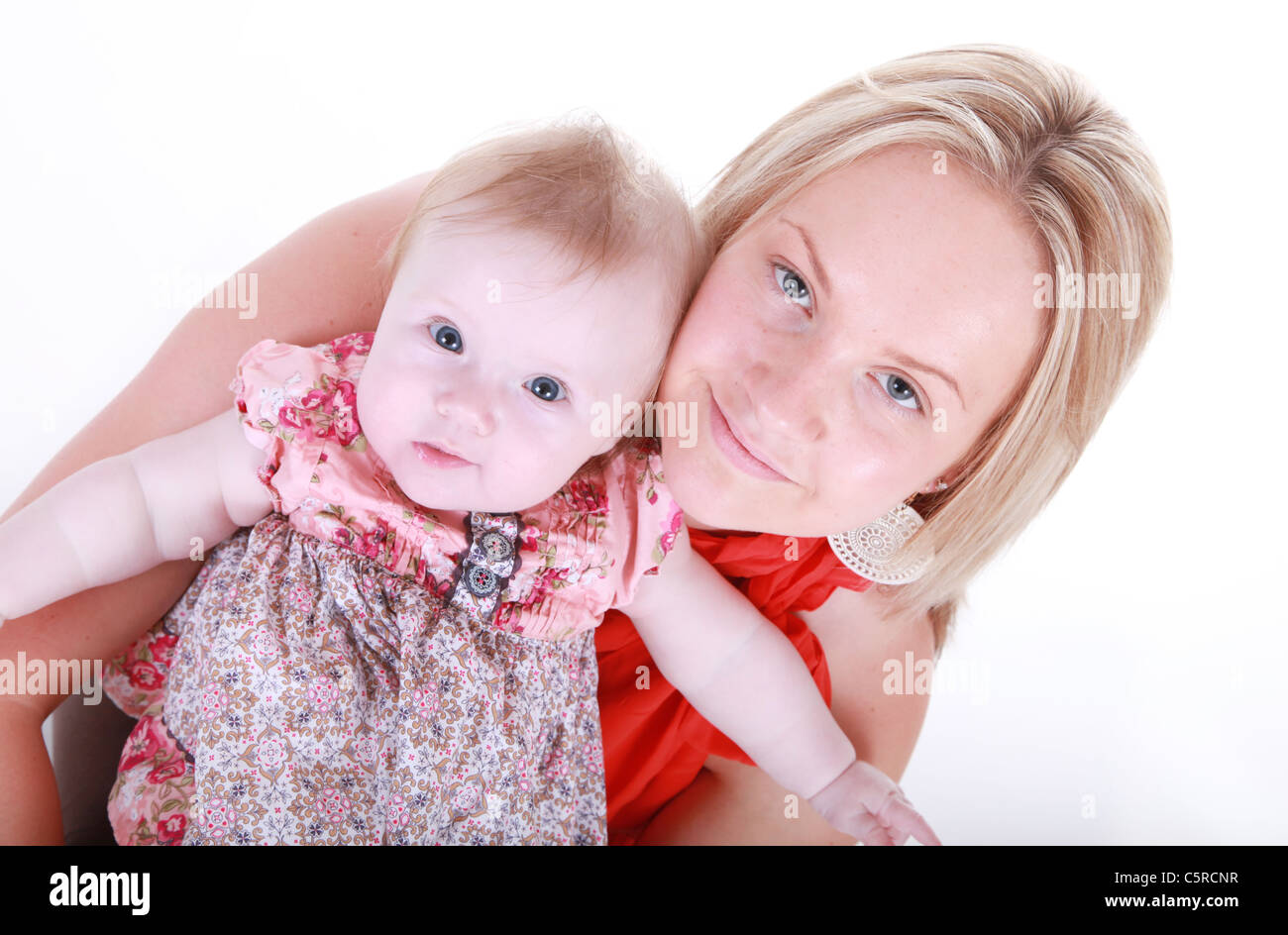 Junge Mutter mit 6 Monate alten Baby Girl. Stockfoto