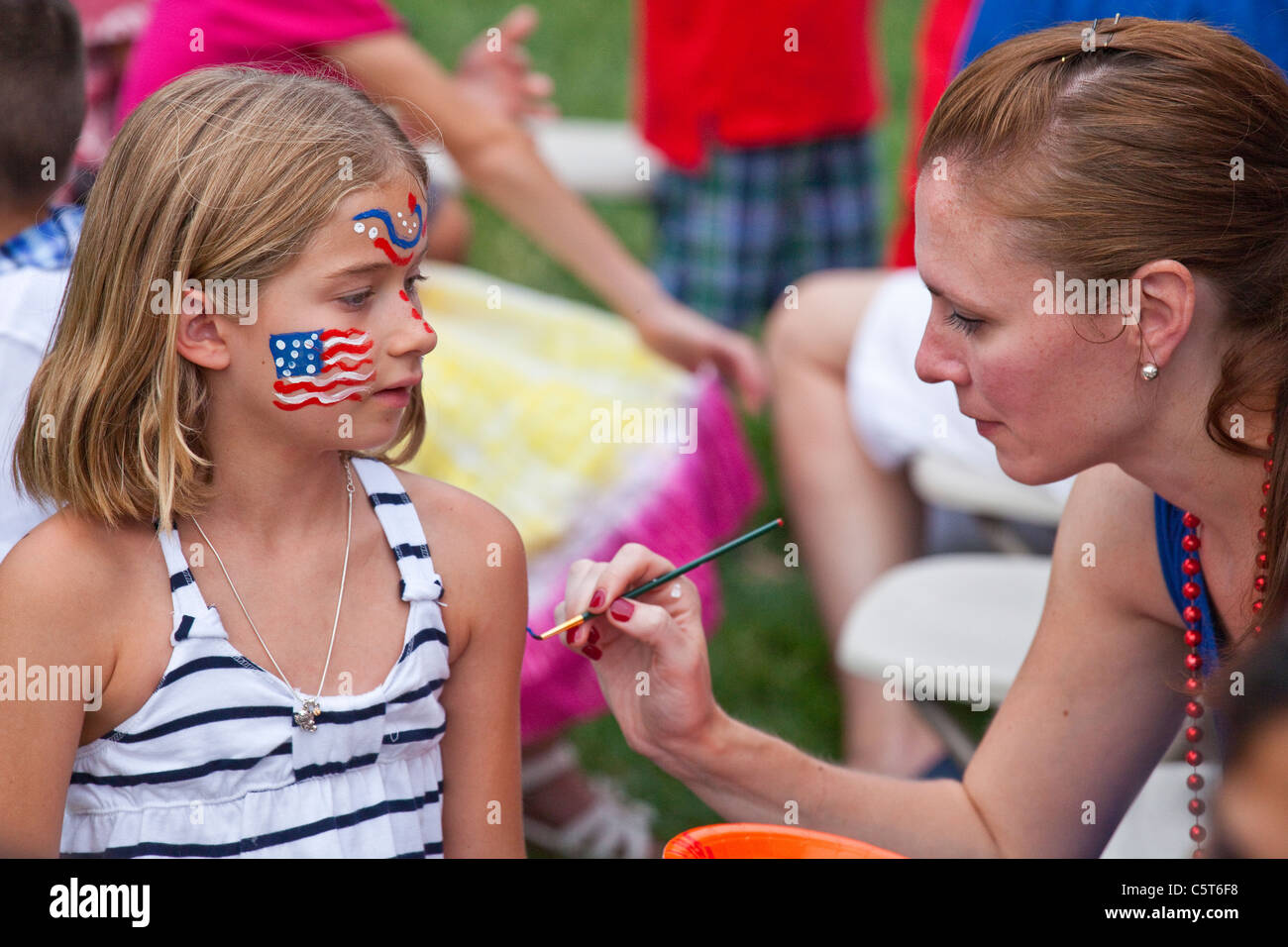 Kinderschminken auf dem Rasen des weißen Hauses am 4. Juli, Washington DC Stockfoto