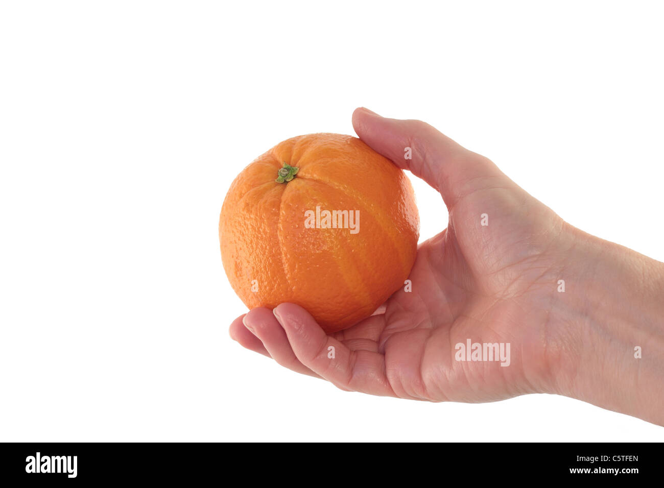 Hand mit Orange, Isolated on White Stockfoto