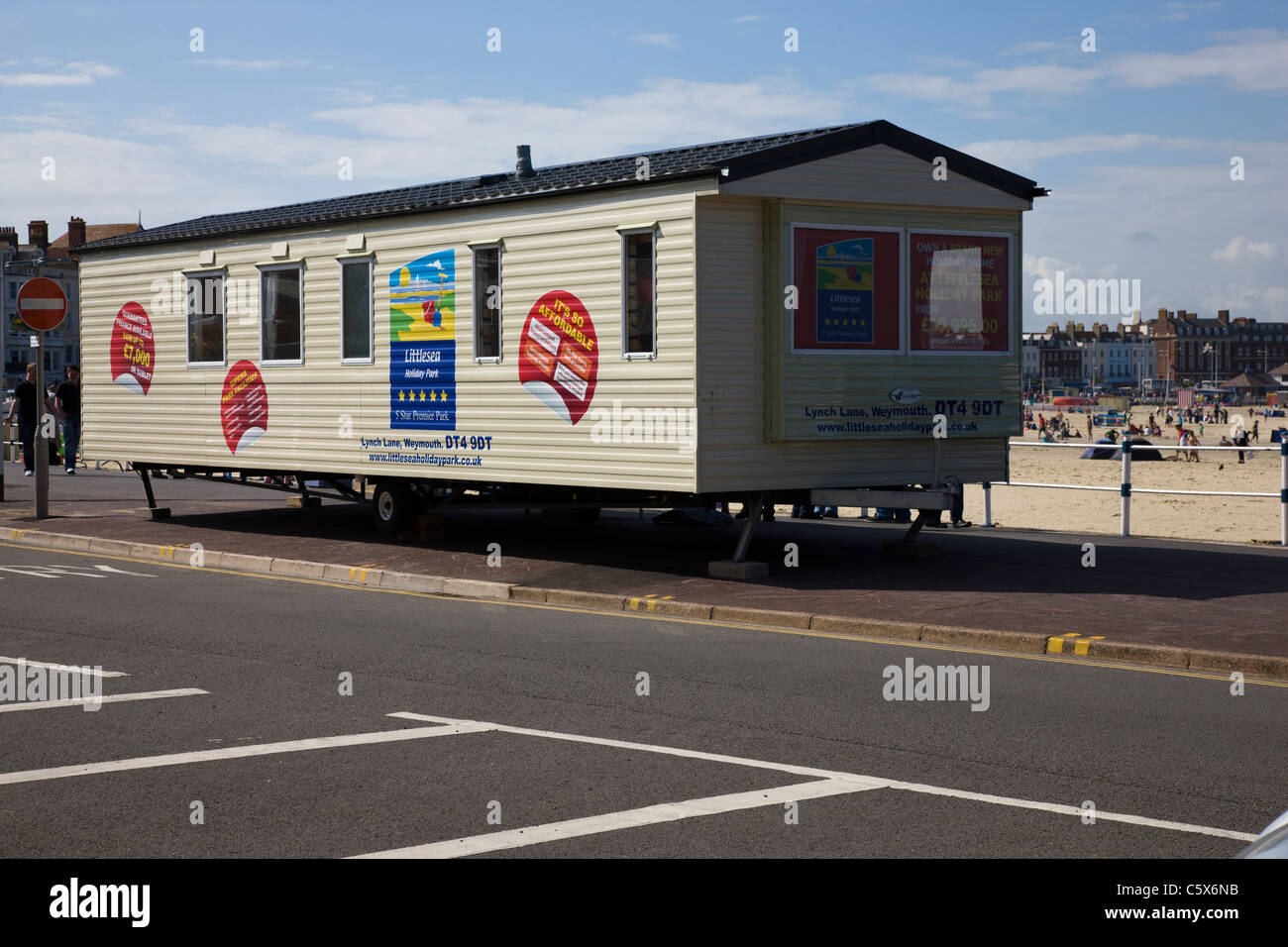 Statische Wohnwagen und Urlaub nach Hause marketing Suite angekündigt am Meer in Weymouth, Dorset Stockfoto