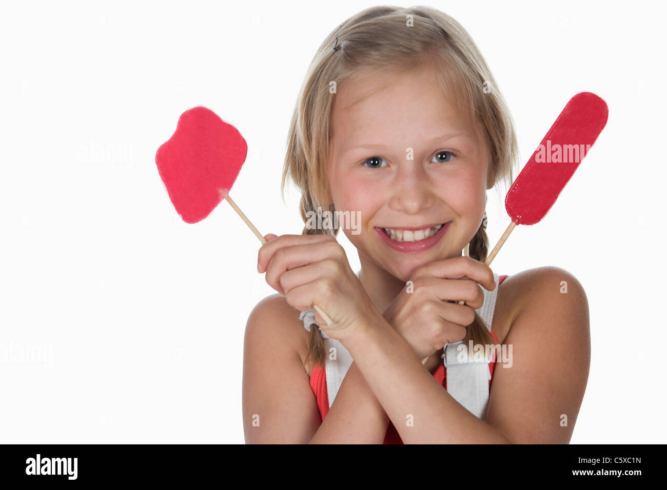 Mädchen (10-11) halten Lutscher, Lächeln, Porträt Stockfoto