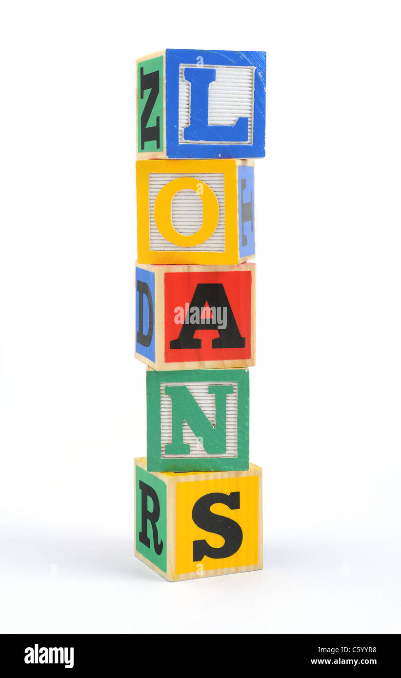 das Wort "Darlehen" geschrieben, mit der Kinder-Buchstaben-Blöcke Stockfoto