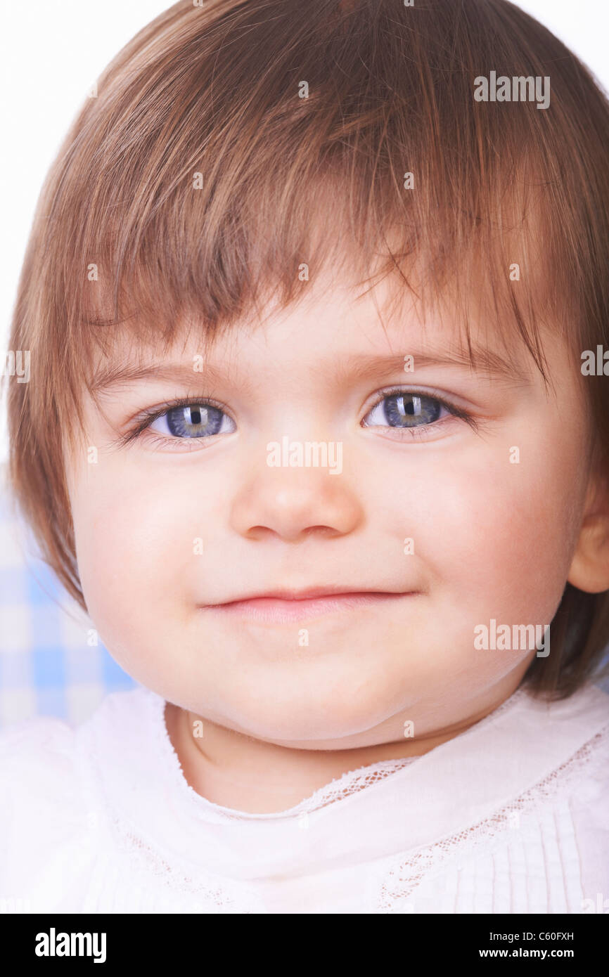Babymädchen lächelndes Gesicht Nahaufnahme Stockfoto