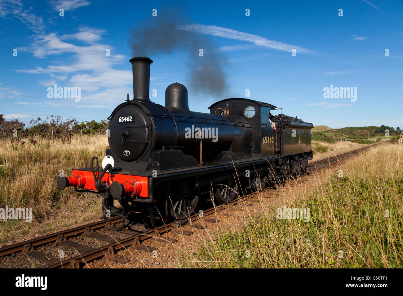 Dampfzug auf der Mohn-Linie, die von Sheringham in Norfolk East Anglia, England Stockfoto