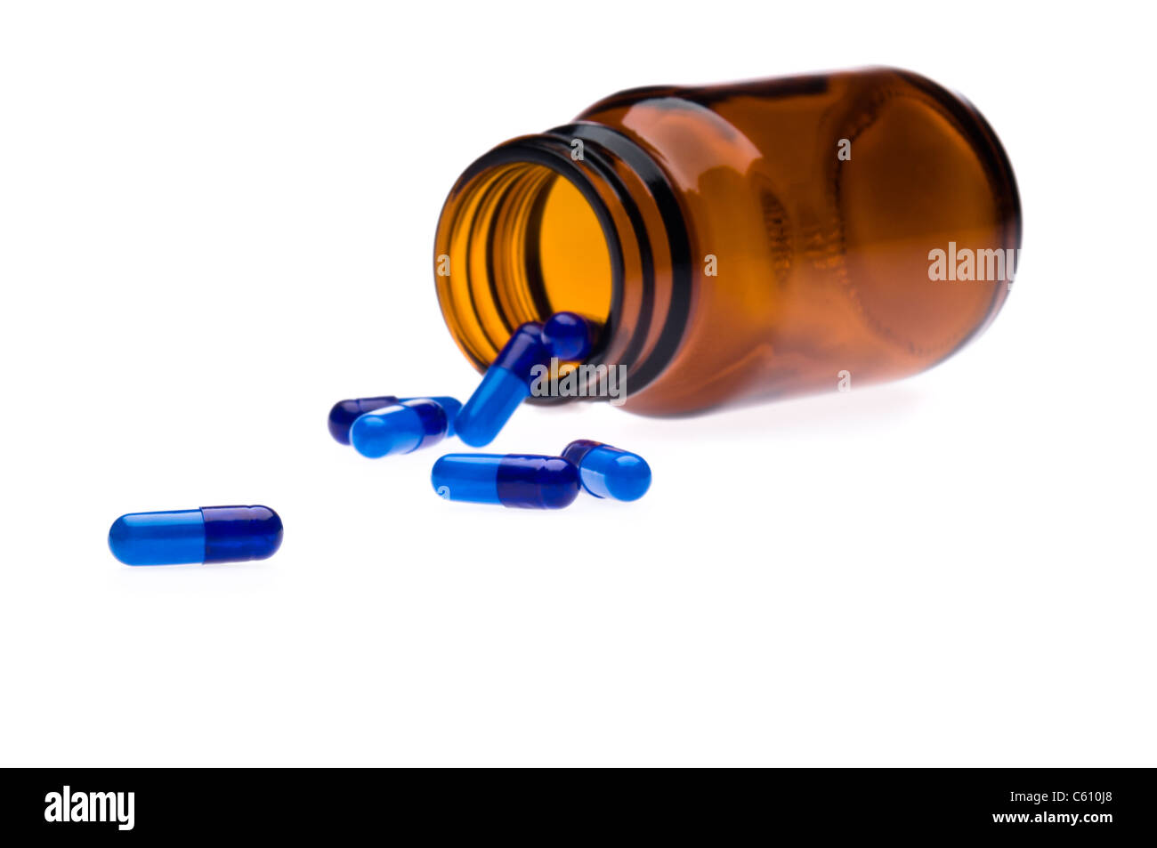 Eine Flasche weißen Pillen, übergegriffen. Stockfoto