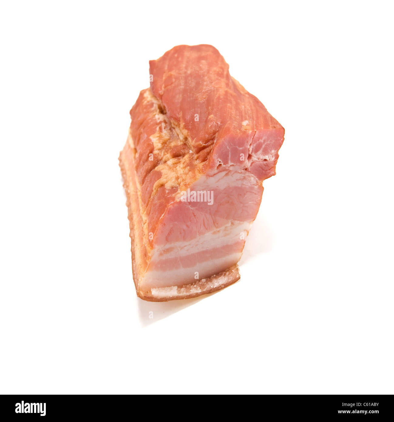 Stück ein Speck ist isoliert auf einem weißen Stockfoto
