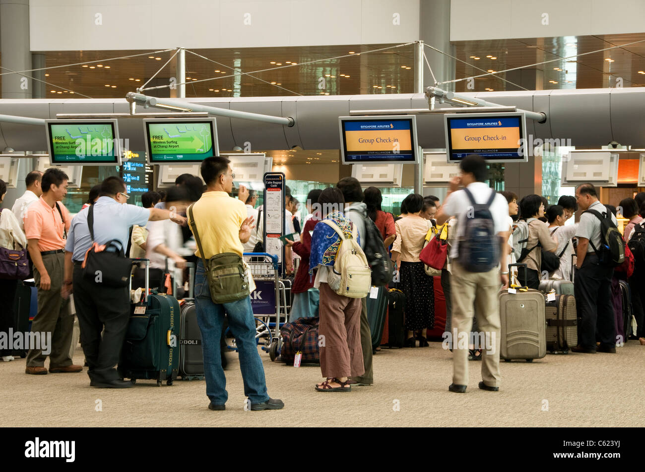 Singapore Airlines Group Check-in Schalter, Abflughalle im Terminal 3 des  Changi Airport, Singapore Stockfotografie - Alamy