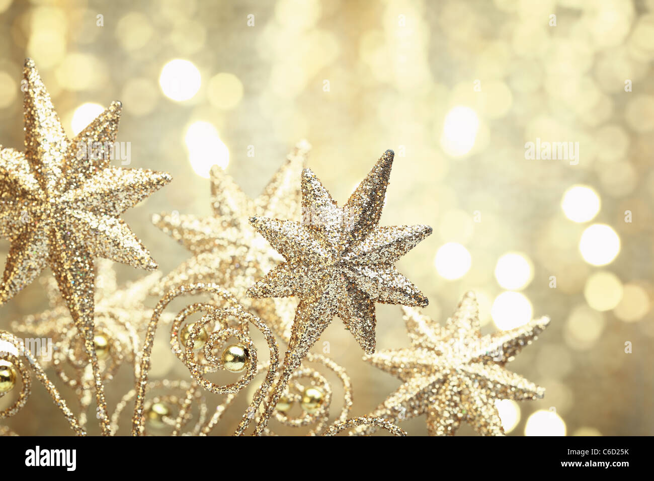 Nahaufnahme des goldenen Stern auf abstrakte goldenen Hintergrund. Stockfoto