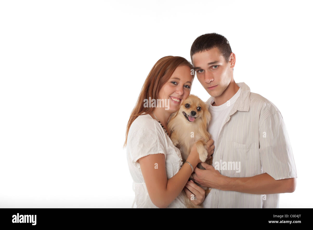 Junges Paar mit Pommerschen Hund Stockfoto