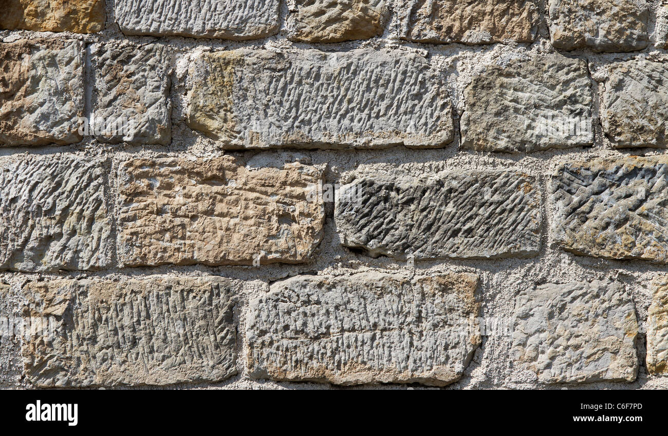 Hintergrund oder die Textur von einer massiven Steinmauer Stockfoto