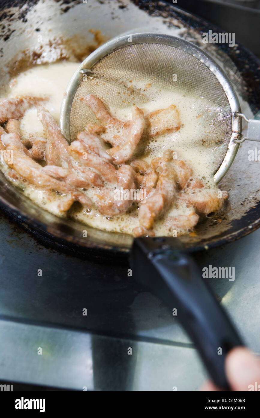 PreparingThai gebratenes Schweinefleisch Stockfoto