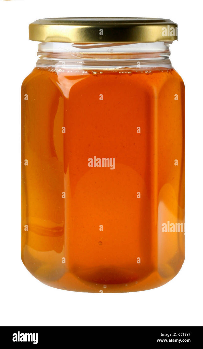 einzelnes Glas Honig auf weißem Hintergrund Stockfoto