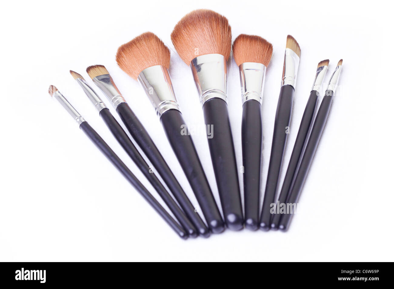 Satz von Make-up Pinsel in Leder gebunden. Nahaufnahme Foto Stockfoto