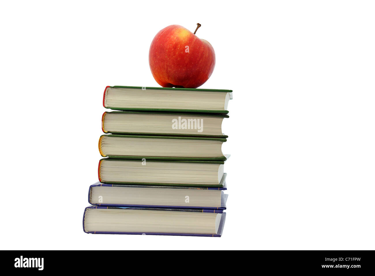 roter Apfel auf Stapel von Büchern Stockfoto