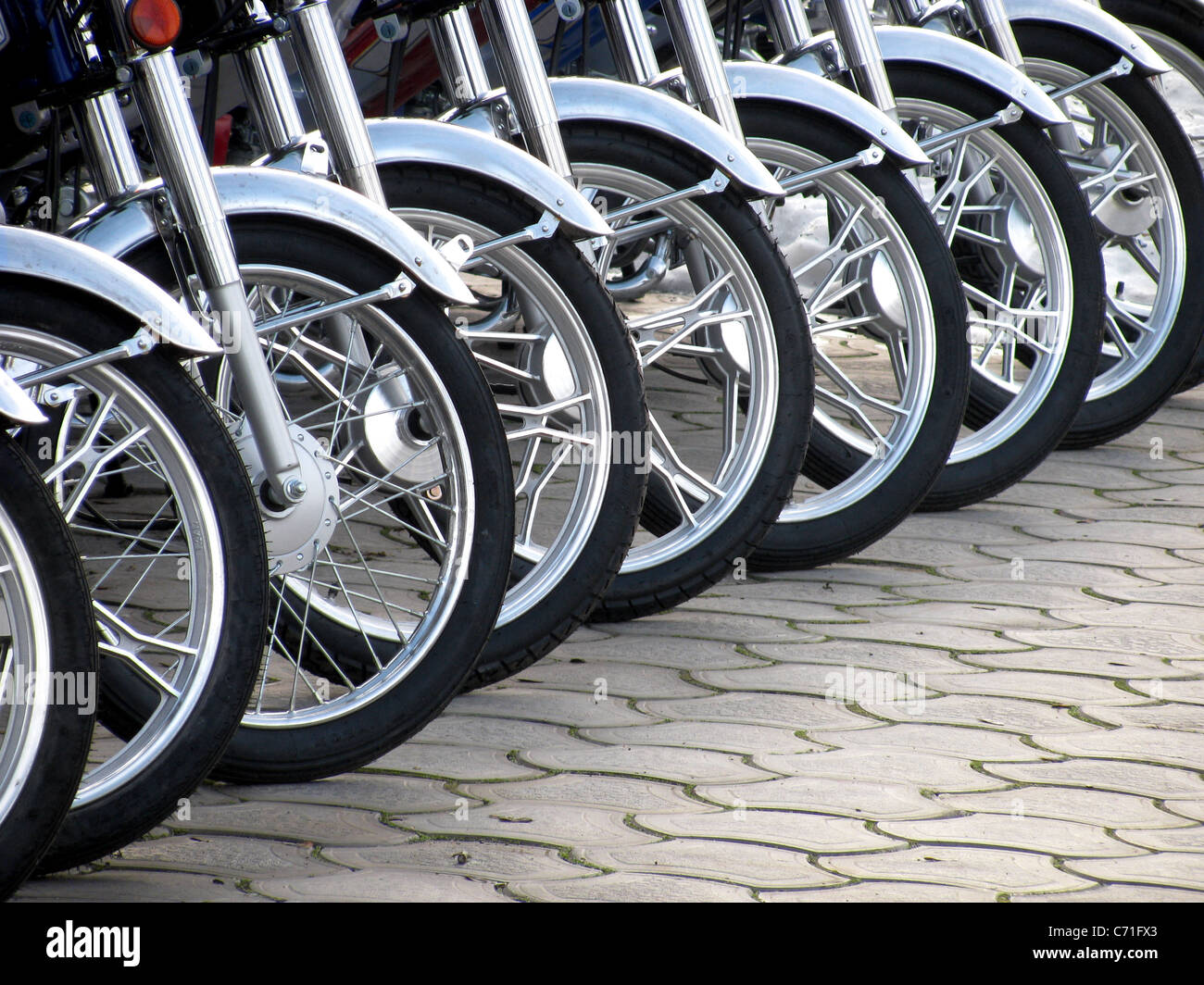 Reihe von Motorrad-Rädern Stockfoto