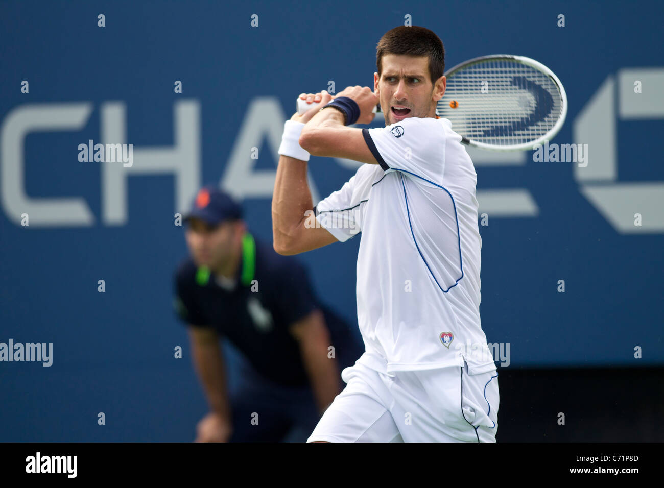 Novak Djokovic (SRB) im Wettbewerb bei den 2011 US Open Tennis. Stockfoto