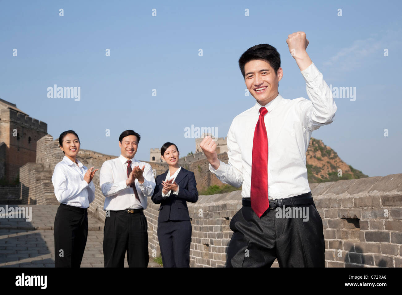 Geschäftsfrau auf der chinesischen Mauer Stockfoto