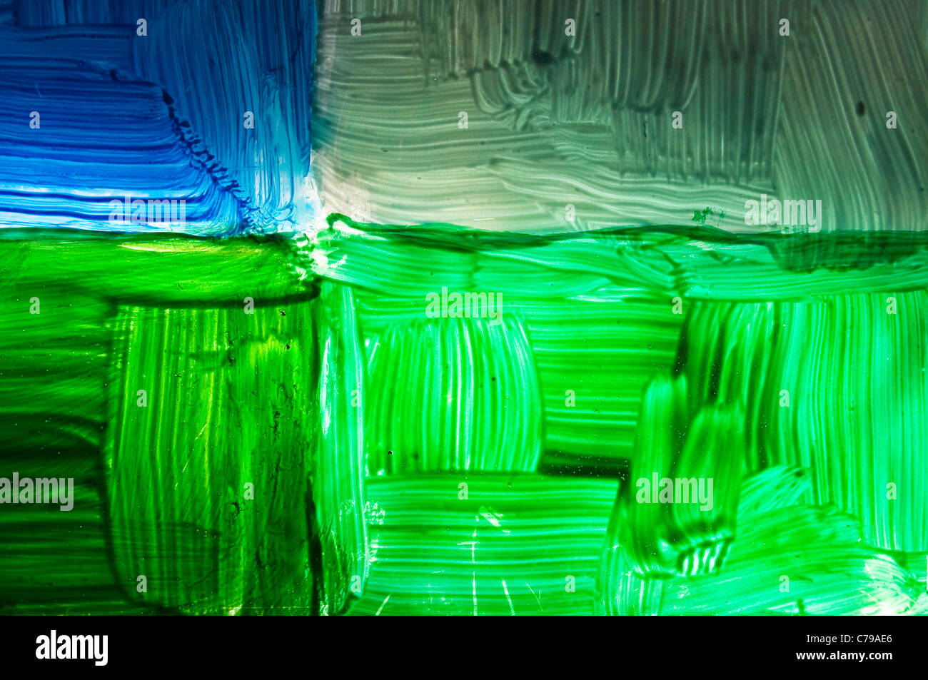 bunte Abstraktion auf Glas, beleuchtet von Sonnenstrahl Stockfoto
